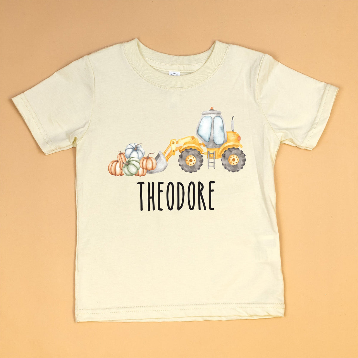 Cuddle Sleep Dream Graphic Tee Front End Loader / 2t Short Sleeve Pumpkin Construction Truck | Natural Tshirt