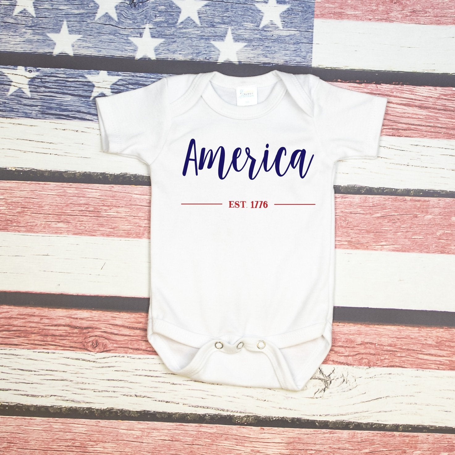 Cuddle Sleep Dream America Est 1776 Onesie