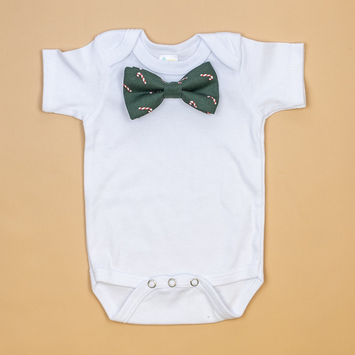 Cuddle Sleep Dream Bowtie Bodysuit Candy Canes on Dark Green Bowtie Bodysuit