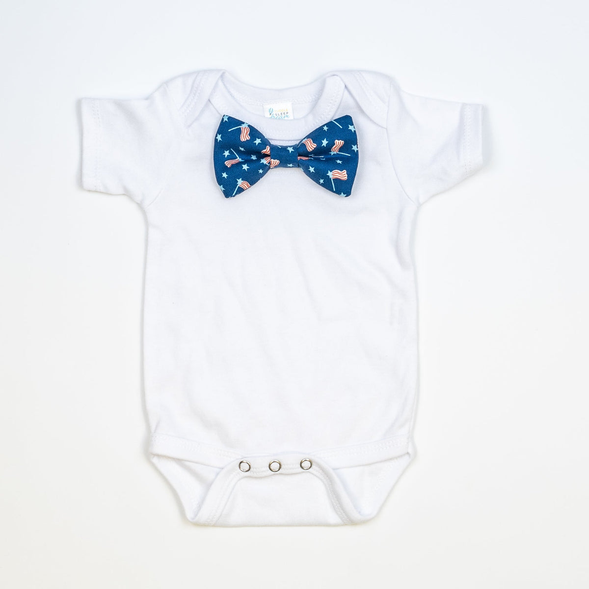 Cuddle Sleep Dream Bowtie Bodysuit Flags on Blue Bowtie Bodysuit