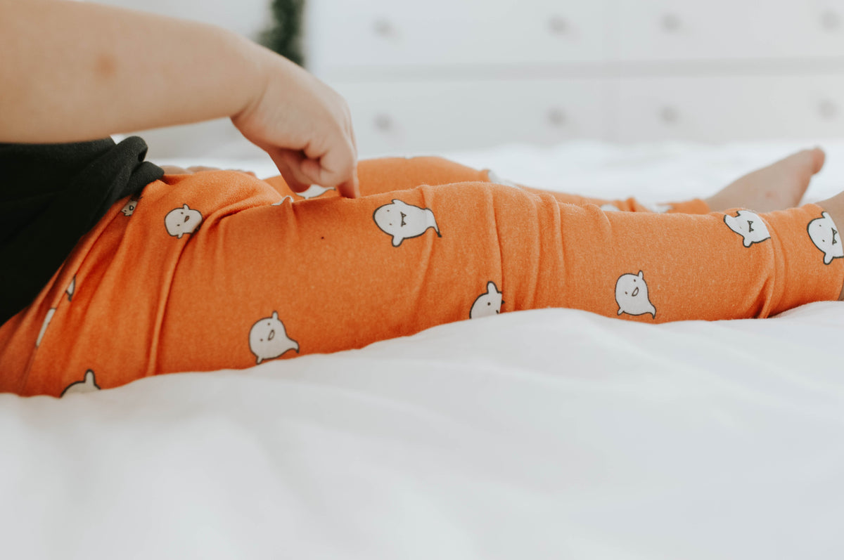 Cuddle Sleep Dream Leggings Ghosts on Orange Leggings