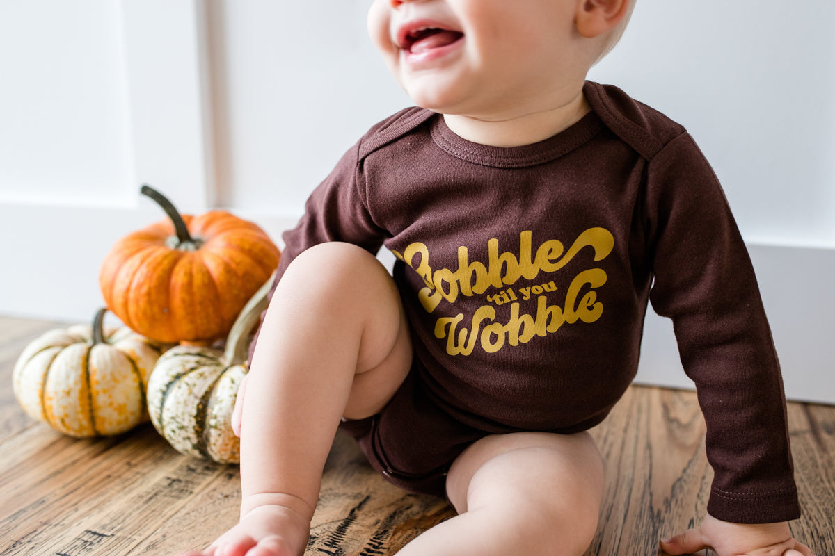 Cuddle Sleep Dream Gobble til you Wobble Onesie