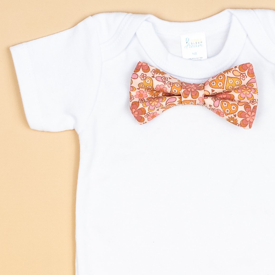 Cuddle Sleep Dream Bowtie Bodysuit Groovy Love Bowtie Bodysuit/Tshirt