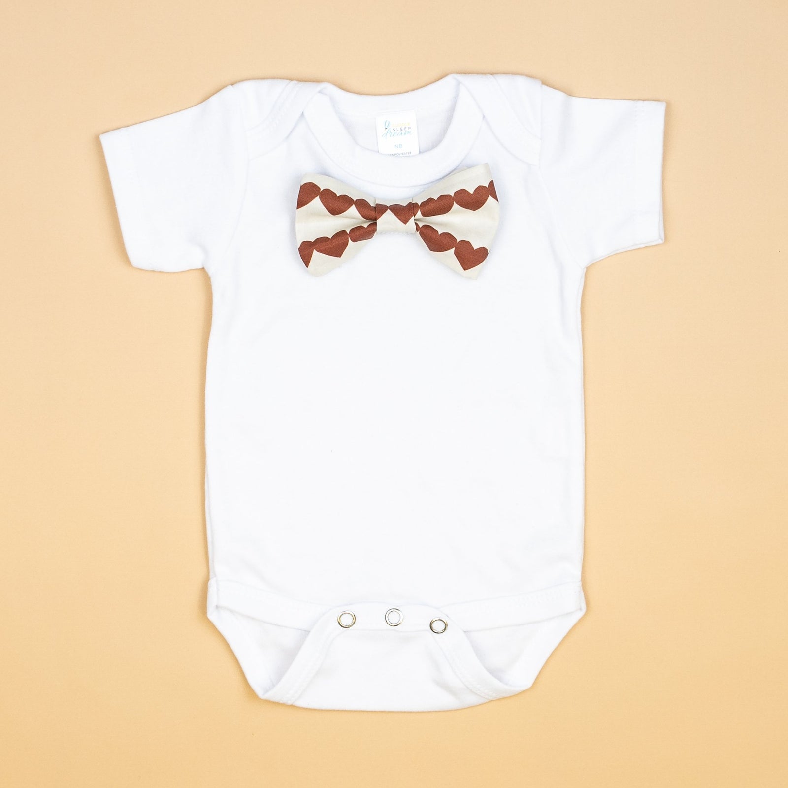 Cuddle Sleep Dream Bowtie Bodysuit Heartstrings in Rust Bowtie Bodysuit