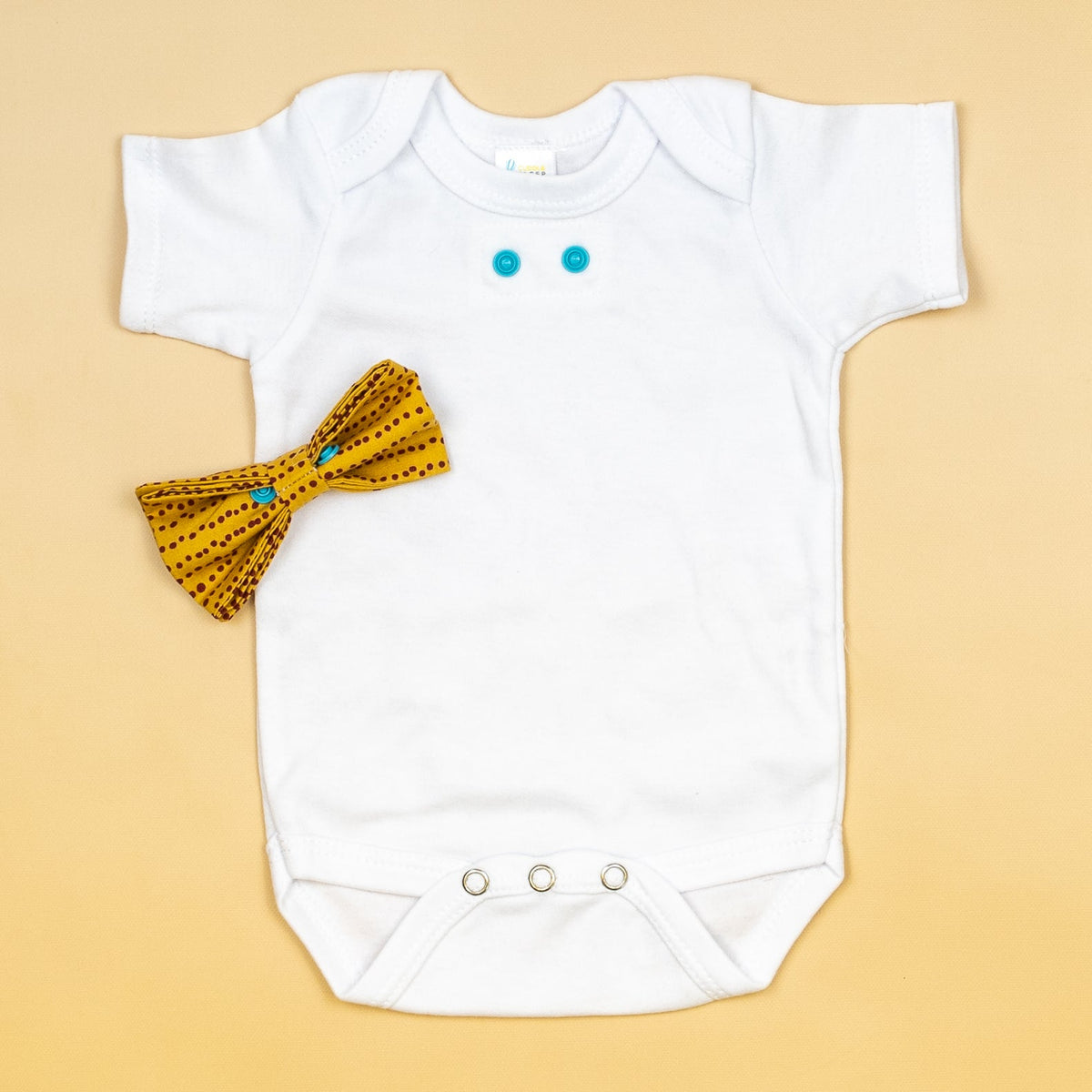 Cuddle Sleep Dream Bowtie Bodysuit Rust Messy Dot on Gold Bowtie Bodysuit