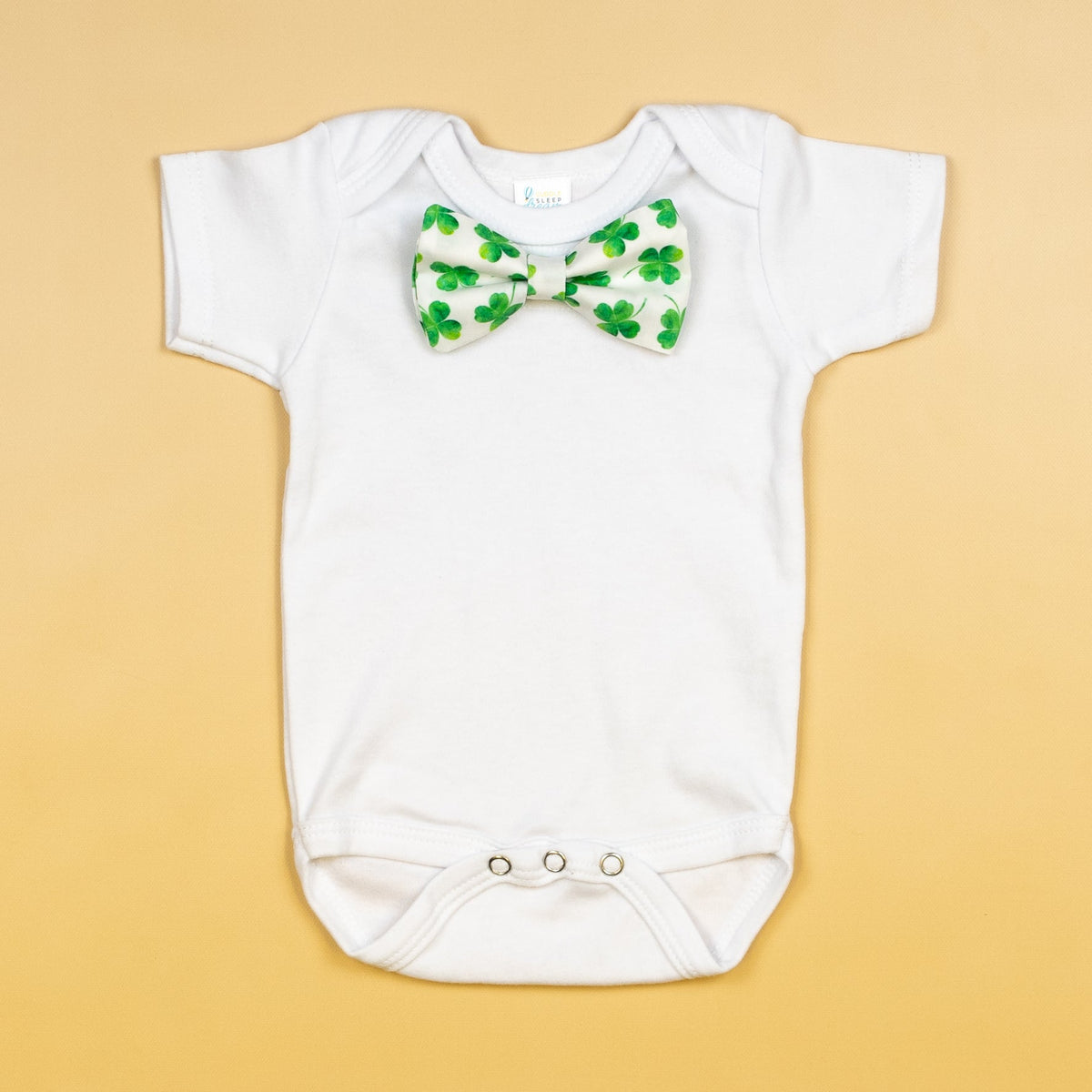 Cuddle Sleep Dream Bowtie Bodysuit Shamrocks on White Bowtie Bodysuit